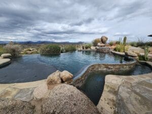 A pool with rocks and water in it